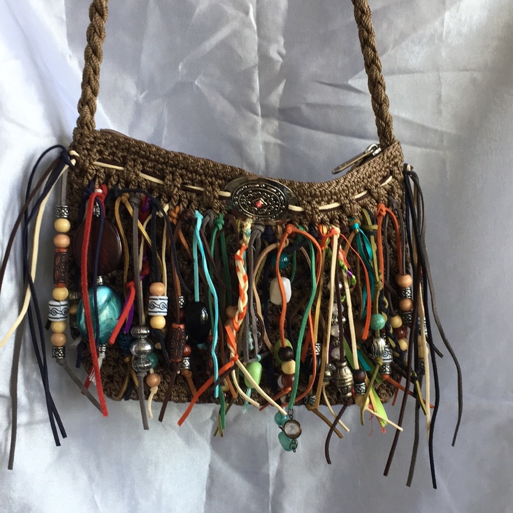 BOHO Crossbody crocheted purse with fringe.